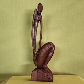 Man Looking Down - Haitian Wood Carving by Ludovic Booz