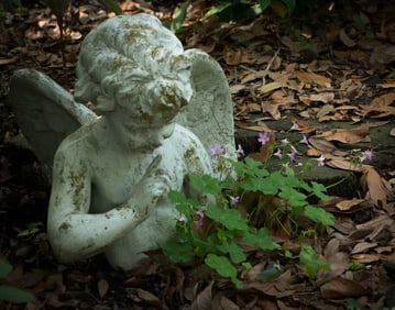 Angel Statue at Houmas House in Louisiana - Metal Print by Glenn Stokes