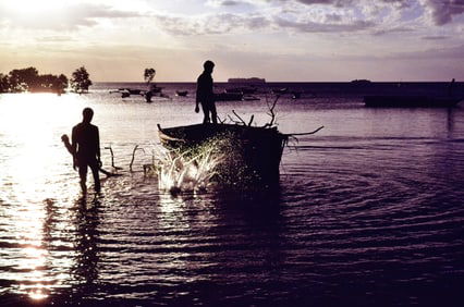 Fishermen in Africa - Metal Print by Glenn Stokes