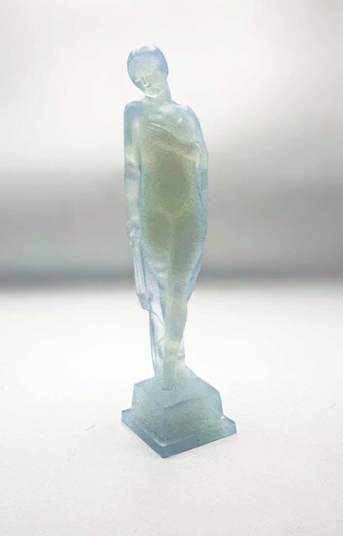 Hesitation Nude Female Figurine, Sabino France: Hesitation Nude Female Figurine, Sabino Franceis an opalescent crystal figurine from The Sabino Crystal Company. The piece is marked in the glass in excellent condition. Measures 6 x 2 x 2 in.