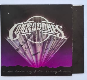 Signed The Comodores Album with Record