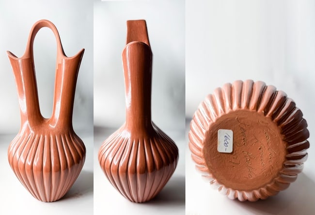Geraldine Sandia – Jemez Pueblo Contemporary Polished Red Wedding Vase: This is a beautiful San Ildefonso Pueblo pottery piece by Linda Dunlap, likely from the late 1970s or 1980s based on her active period and similar signed works. Linda Dunlap (born 1955) is part of