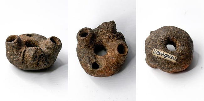 Pre-Columbian Terracotta Multi-Tubular Object (Possibly Ritual Incense Burner or Aerophone ): A fascinating and enigmatic small Pre-Columbian terracotta artifact of organic, asymmetrical form, featuring a roughly heart- or lobe-shaped body with three protruding tubular openings (central