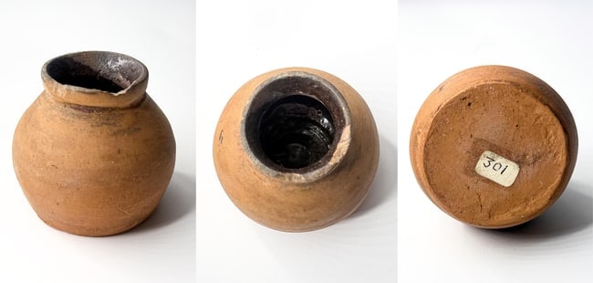 Pre-Columbian Miniature Globular Terracotta Jar (Plain Undecorated Olla Form), Mesoamerican or West: **Description:** A well-preserved Pre-Columbian miniature terracotta jar of classic globular/olla shape, featuring a wide everted rim, short constricted neck, rounded bulging body, and flattened base