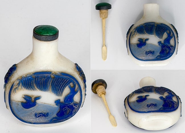 Chinese Blue Overlay Milky-White Glass Snuff Bottle Cornelius Osgood Collection: **Chinese Blue Overlay on White Glass Snuff Bottle with Mandarin Ducks Motif** **Qing Dynasty, 18th Century** **From the Cornelius Osgood Collection** This elegant antique Chinese snuff bottle is a