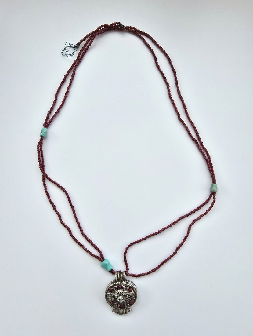 Antique Tibetan Coral and Silver Necklace 2 From the Cornelius Oswald Collection: This stunning tribal necklace is a standout piece from the renowned Cornelius Oswald Collection, a carefully assembled trove of rare ethnographic adornments, antique silverwork, and cultural