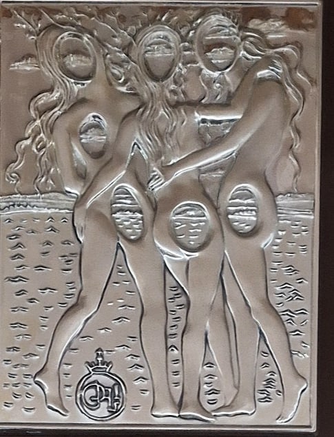Salvador Dalí (1904–1989) Les Trois Grâces / The Three Graces, Sterling Silver 925 Bas-Relief: Les Trois Grâces (The Three Graces / Las Tres Gracias), circa 1977Sterling silver (925/1000) bas-relief plaque, signed in the plate with Dalí’s distinctive crowned “SD” monogram at lower l