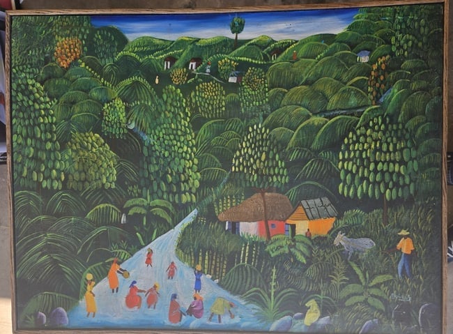 Bustling Haitian Market Scene by W. Keringel: Vibrant and expansive original painting depicting a lush, rolling Haitian countryside. The composition is dominated by dense green hills covered in stylized vegetation, banana plants, and fruit-bearin