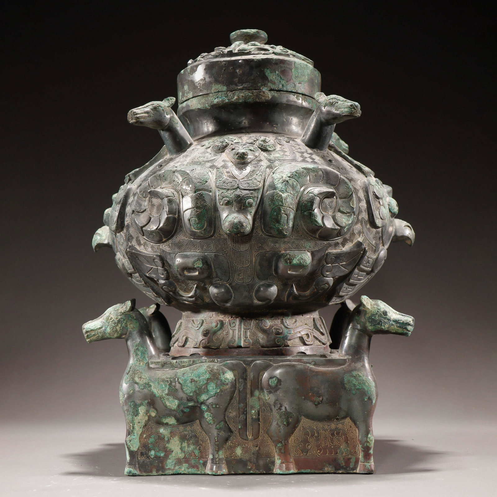 A Bronze Wine Vessel Hu Shang Dynasty: A Bronze Wine Vessel Hu Shang Dynasty H:32.5cm;W:22.5cm