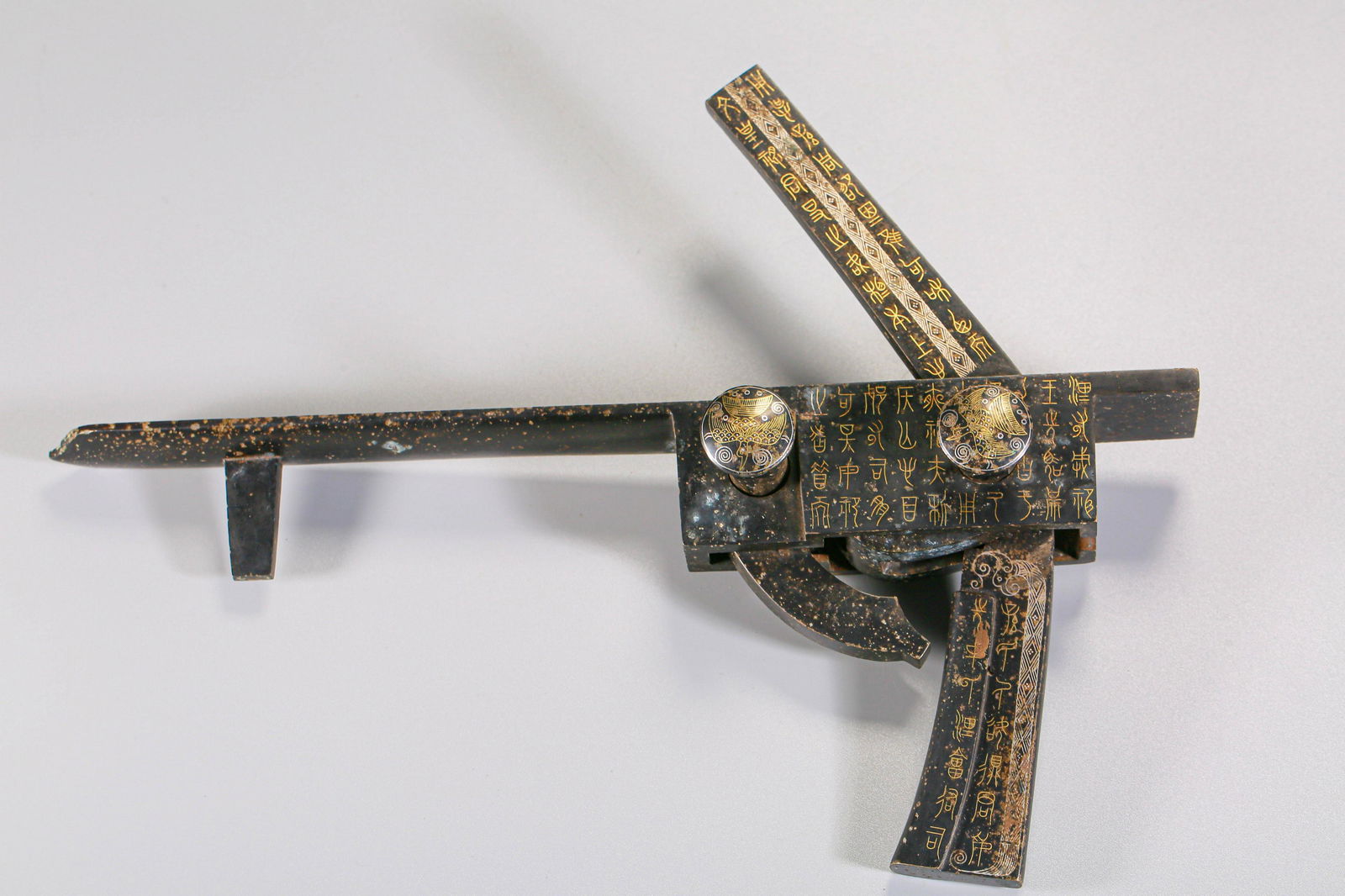 A Chinese Silver Inlaid Parcel Gilt Bronze Crossbow Han (1 of 9)