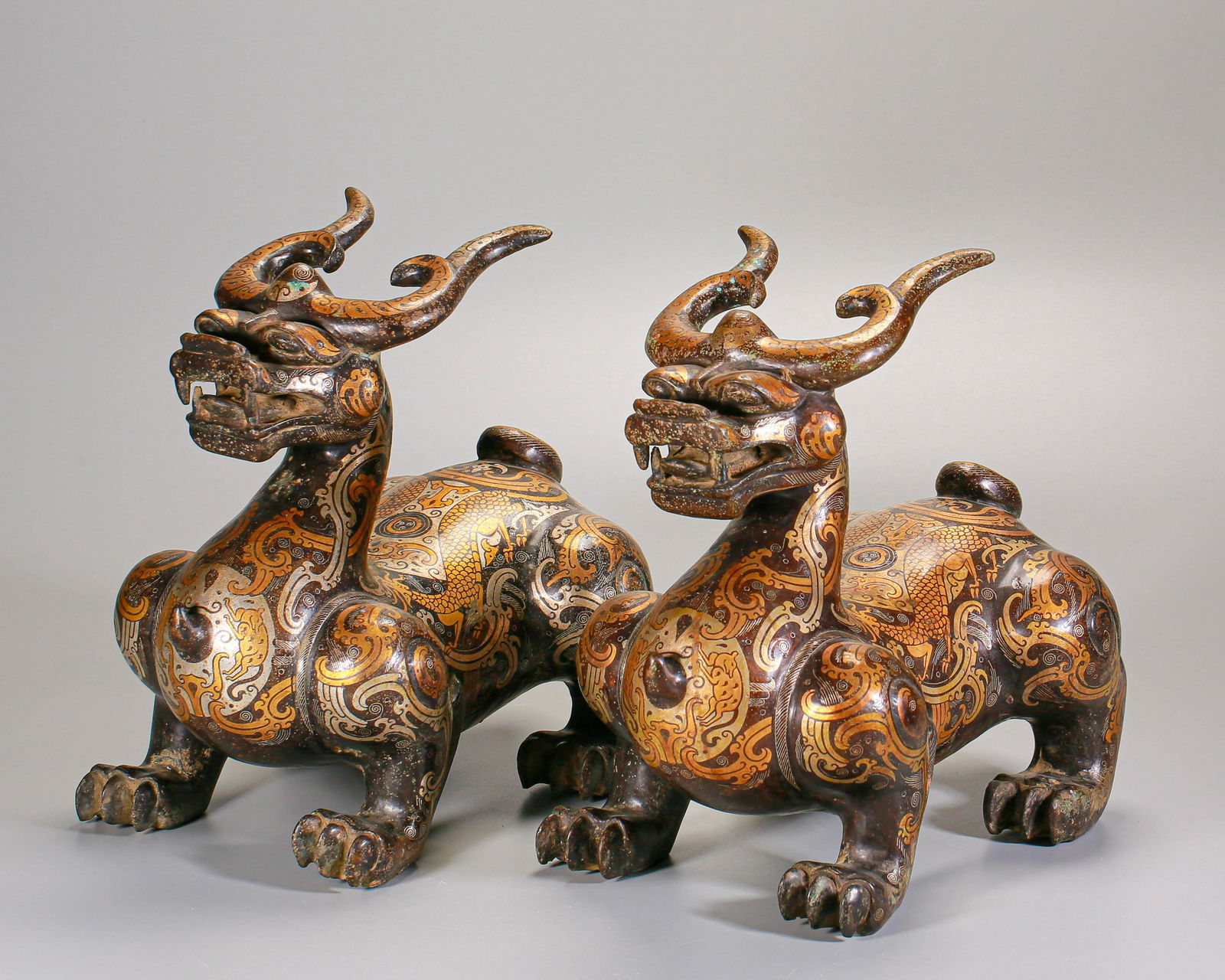 Pair Chinese Silver Inlaid Parcel Gilt Bronze Beasts (1 of 9)