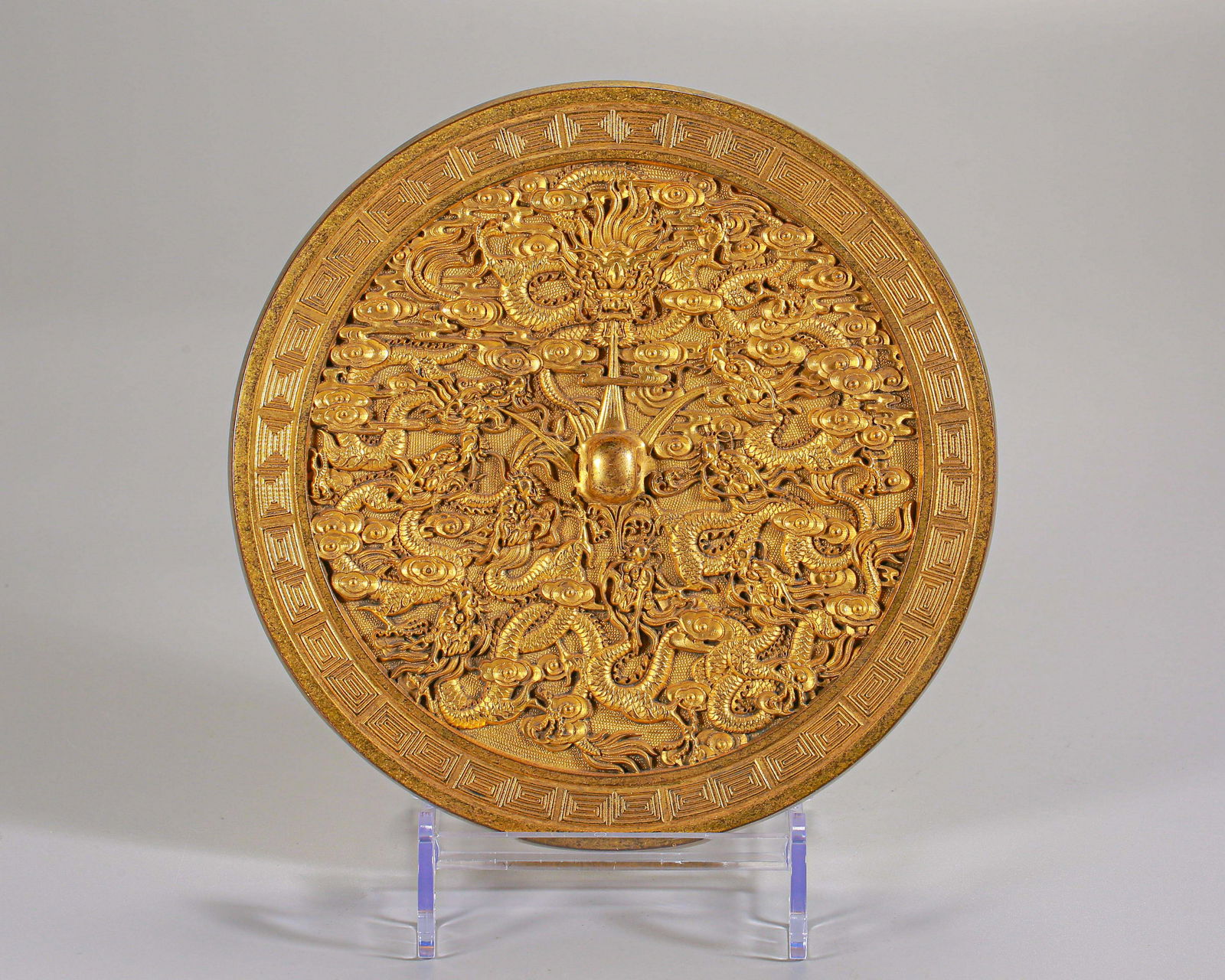 A Chinese Bronze-gilt Circular Mirror Qing Dyn. (1 of 9)