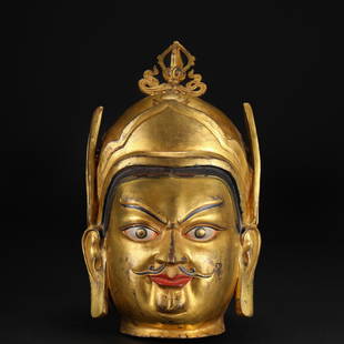 A Tibetan Bronze-gilt Padmasambhava Head: A Tibetan Bronze-gilt Padmasambhava Head H:39cm;L:19cm;5kg