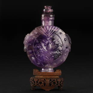 A Chinese Carved Amethyst Snuff Bottle Qing Dyn.: A Chinese Carved Amethyst Snuff Bottle Qing Dyn. H:13cm;L:9cm;292g