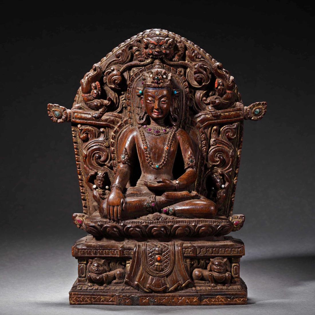 A Tibetan Carved Rosewood Figure of White Tara (1 of 12)