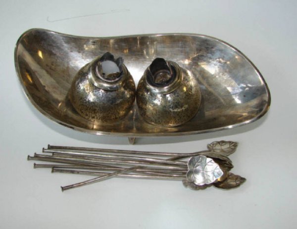 Mexican Sterling Bowl, Teaspoons, Candleholders.: Group of Mexican sterling silver comprising free form footed bowl, pair of hand hammered candle holders and set of eight ice teaspoons straws with leaf form bowls.
