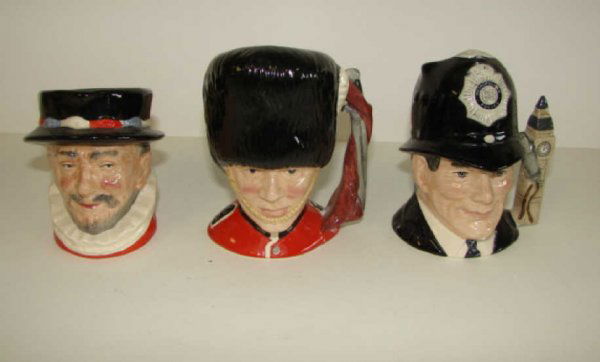 Group of 3 Royal Doulton Character Mugs. 3 - 4": Height 3 - 4 inches, each. Comprising The Guardsman, D - 6771, Beefeater D - 6233, "The London Bobby" D - 6762.