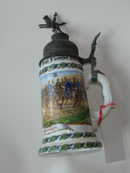 Regiment German Porcelain Stein. Merkle Atelier.: Height - 11.25". Having a pewter hinged lid, lithopane bottom.
