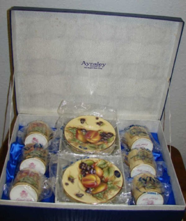 Six Aynsley porcelain demitasse cups, in box.: Set of six Ansley porcelain cups and saucers, in satin presentation box.