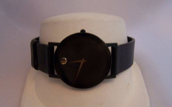 Ladies Movado Watch.: Ladies Movado Watch. Black leather strap. [aww 0241]