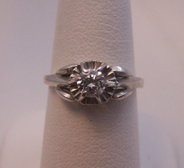 Ladies 18 K White Gold Diamond Engagement Ring.: Ladies 18 K White Gold Diamond Engagement Ring. Estate style solitaire engagement ring. Round cut diamond four prong illusion set style. diamond weight 0.31 carat. total weight 2.9 grams. [awr 1414]