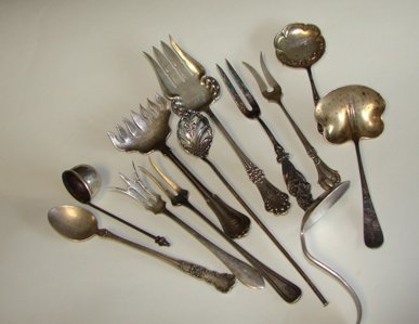 12 Assorted Sterling Serving Articles. Forks, etc.: 12 assorted sterling silver serving articles, pickle forks, spoons, etc.