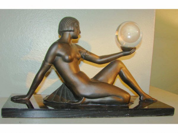Bronzed Metal Art Deco Figure w/ Globe.: Bronzed Metal Art Deco Figure w/ Globe. Height 9", length - 14" including marble base. Detail of the foundry mark.