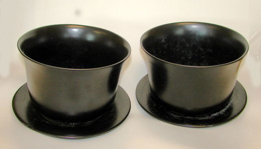 Pair (2) Elsa Peretti Ceramic Orchid Pots.: Pair (2) Elsa Peretti Orchid pots with under plates, ceramic with basalt black matte glaze, Bearing the Tiffany hallmark beneath.