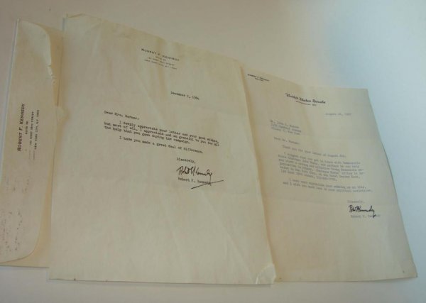 Two (2) Autographed Letters Robert F. Kennedy.: The first dated December 3, 1964, from 140 W. 33rd St. New York,NY, with the original envelope, the second from the United States Senate, dated August 16, 1967. Both signed in felt pen "Robert Kennedy