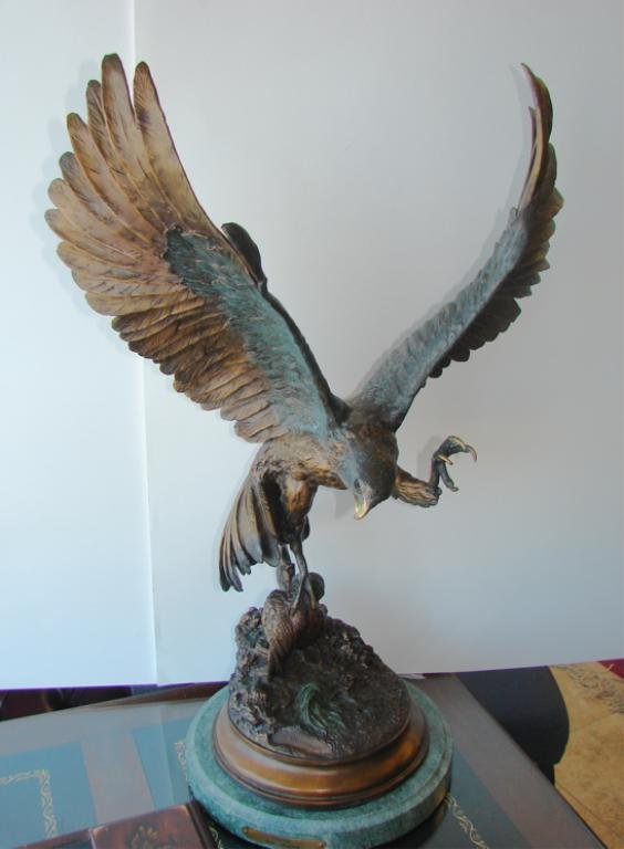 Bronze "Falcon" After Jules Moigniez. H - 26": Bronze sculpture of a falcon with prey, inscribed on the base "J. Moigniez" mounted to a green marble base with brass plaque.