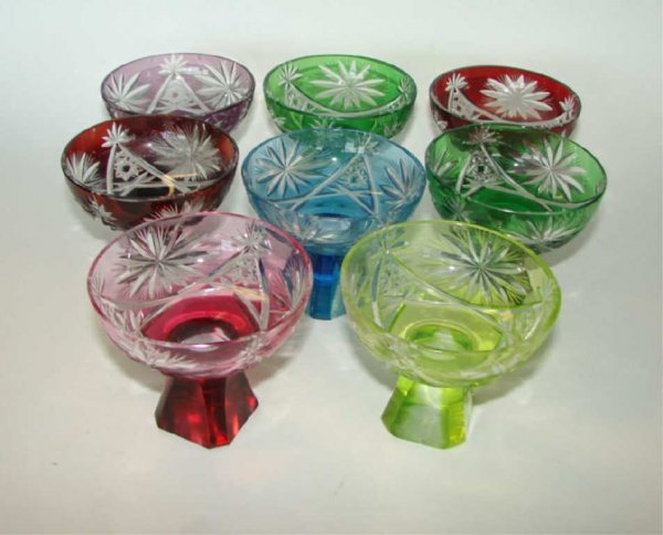 Set of eight (8) Bohemian Cut Crystal Coupes.: Multi colored, some minor chips.