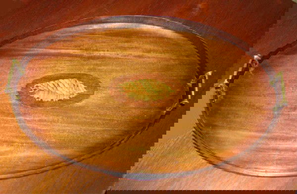 Georgian style mahogany serving tray.: Wood galleried oval form with nicely inlaid conch shell center reserve, brass handles.