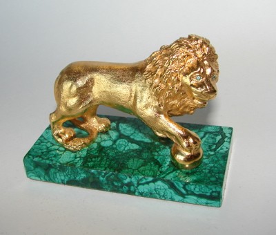 Russian Dore Bronze Malachite Lion Figurine.: 20th century. Height - 2.6 inches, length 3.5 Manufactured by Sentyabrev, a craft guild located in St. Petersburg, Russia, specializing in the reproduction of fine decorative 18-19th C. pieces."