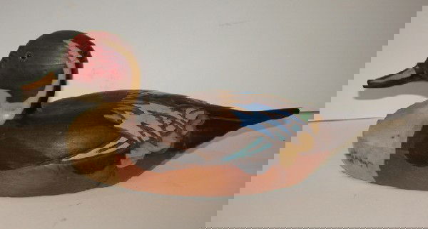 Duck decoy, signed Tom Taber.: Nicely painted and carved, the signature branded on the base.
