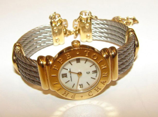 Ladies watch, Phillippe Charriol.: Philippe Charriol Stainless steel, gold plated two tone ladies watch. Mother-of-pearl dial. Quartz movement. 48.2 grams. [40 - 80]