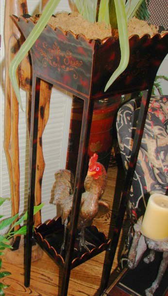 Maitland-Smith lacquered, gilt tall plant stand.: Maitland-Smith lacquered and gilt tall plant stand.H - 46.5", W - 14.5", D - 14.5". A plant stand with a faux tortoise lacquered finish with lined gilt and scroll highlights. The planter with scallope