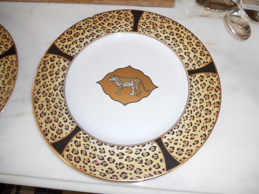Set of (3) porcelain cabinet plates, Lynn Chase.: Set of three (3) porcelain cabinet plates, Lynn Chase "Amazonian Jaguar" .Showing one of three. Diameter - 12". Depiction of leopards on the center reserves, hallmarked on the base.