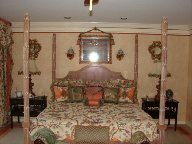 Kings size four poster bed, pickled mahogany.: Kings size four poster bed, pickled mahogany. Custom 20th C. reproductions. Custom made in the Chippendale manner having a shaped headboard, four tapered carved posters with stylized carved running la