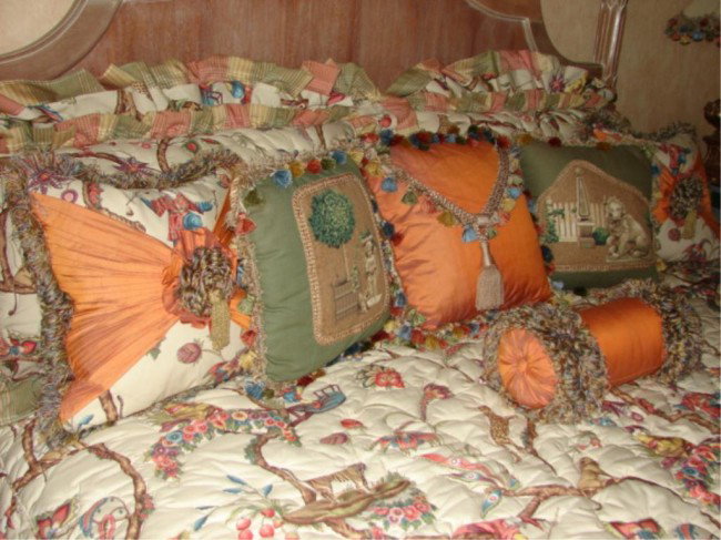 Assorted decorative custom pillows and bedding.: Including chintz king size bed covers, matching and accent pillows.