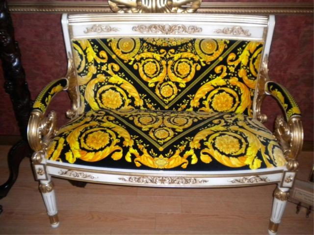 Versace Upholstered settee w/certificate.: Gilt carved with custom Versace fabric. With register and certificate papers.