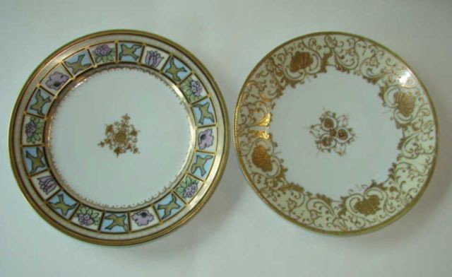 Two hand painted "Nippon" cabinet plates.: Diameter 8", and 8 1/2" gilt encrusted. Very small chip to rim of one.