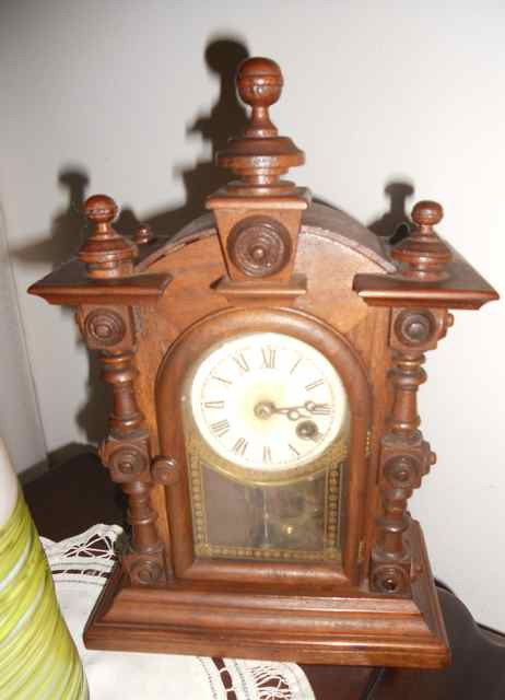 Victorian Walnut Diminutive Shelf Clock. H - 11".: Condition: some slight discoloration of the face. A percentage of the proceeds will be donated to the Al and Olga Barnes Scholarship Fund, Community Foundation of Tampa Bay.
