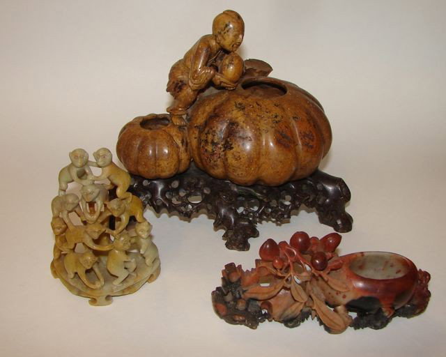 Group of Four Chinese Hardstone Carvings.: Three of the four with minor loss. Comprising China man on mellons, monkey pyramid, double vase and cherry blossom, and cherry cluster vase.
