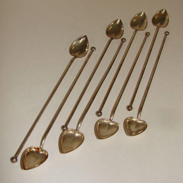 Set of 8 Sterling Ice Tea Straw Spoons. 2.7 oz.: Leaf form spoon bowls.