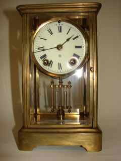 Ansonia Crystal Regulator Clock.: H - 10.75 inches. The Face with the Ansonia monogram, also noted on the bottom,Manufactured by the Ansonia Clock Co. New York United States of America. Pendulum driven for time and strike Roman numera