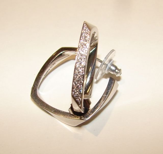 Tiffany & Co. 18K W/Gold Diamond Hoop Earrings.: Designed by Frank Gehry and made for Tiffany. 11.8 grams total weight, and measuring, 25 mm in diameter, the hoops are modified square form, accented with pave set diamonds. .Friction post backs. Bear