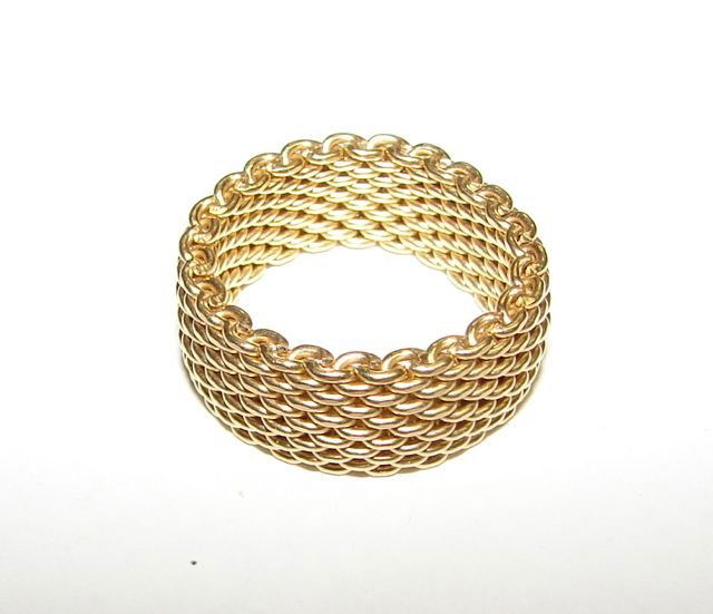 Tiffany & Co. 18K Yellow Gold Mesh Ring.: 14.8 grams total weight. The band is 3.80 mm wide, size 10, not sizeable. [03]