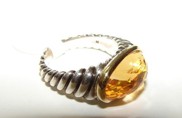 David Yurman Sterling 18K Gold Citrine Ring.: 7.3 grams total, size 6. not re-sizable. 15 mm x 8 mm oval cut facet citrine. [40]