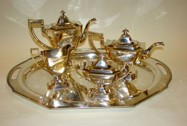 Gorham 5 Piece Sterling Tea & Coffee Service.: Comprising a coffee pot, tea pot, creamer, sugar bowl. Matching pattern Sheffield (silver on copper) tray with Gothic "G" monogram. 60.1 troy ounces. Condition: very minor dents.