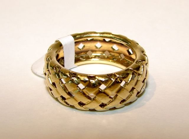 Tiffany & Co. 18K Yellow Gold "Weave" Ladies Ring.: 9.8 grams total weight. The band is 2.45 mm wide. Size 7.5, not sizable. [04]